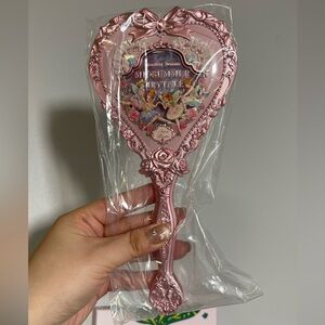 Flower Knows Hand Mirror